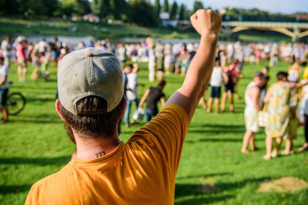 city-day-music-festival-entertainment-concept-visit-summer-festival-guy-celebrate-holiday-festival-summer-fest-man-bearded-hipster-front-crowd-book-ticket-now-open-air-concert