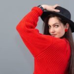 portrait-young-woman-red-hat-against-white-background